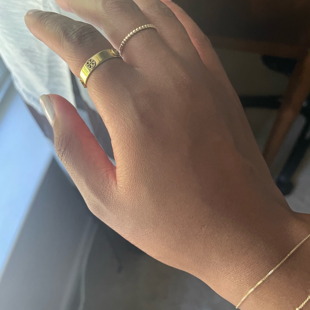 Tory Burch cigar band ring. Yellow Gold. Size 7.